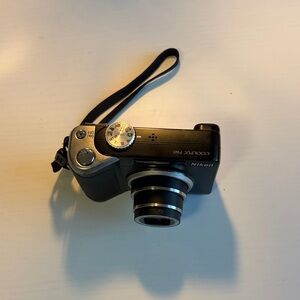 Nikon Coolpix P60 Silver and Black Camera